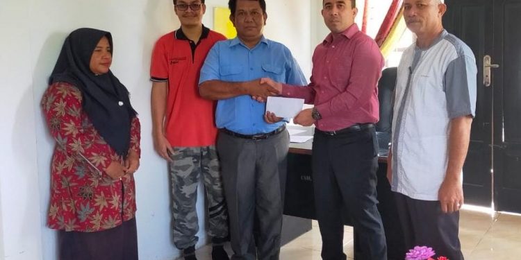 PT Kallista Alam Salurkan Donasi untuk Diki Fadillah Penderita Hidrosefalus