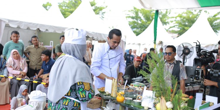 Nagan Raya Sajikan Aneka Kuliner Beralaskan Batu Giok di PKA-8
