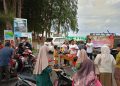 Projo Aceh Jaya membagikan 1000 paket susu kue dan buah gratis untuk masyarakat Aceh Jaya