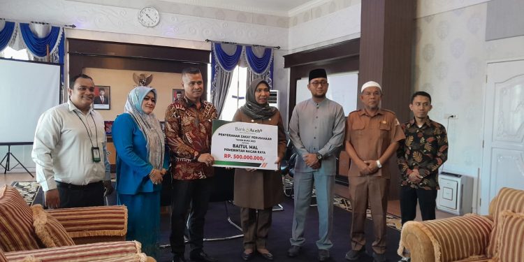 Bank Aceh Syariah Salurkan Rp 500 Juta Zakat Perusahaan Melalui Baitulmal Nagan Raya